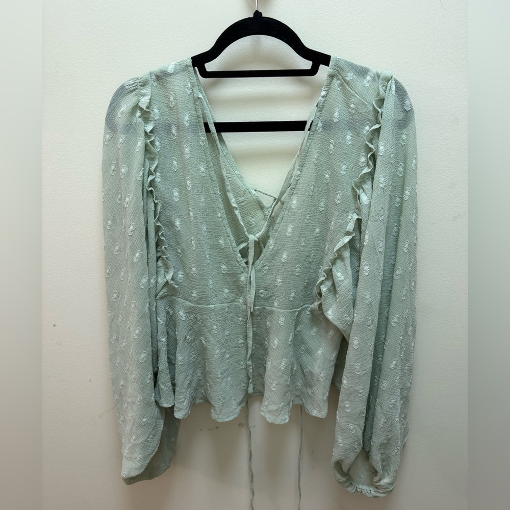 ASOS DESIGN textured long sleeve blouse with lace up front & peplum hem - SAGE